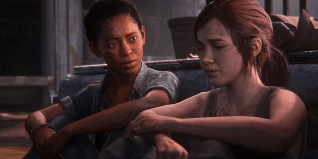 The queer characters Ellie and Riley from the game The Last Of Us have serious expressions on their faces and their arms crossed over their knees while sitting.