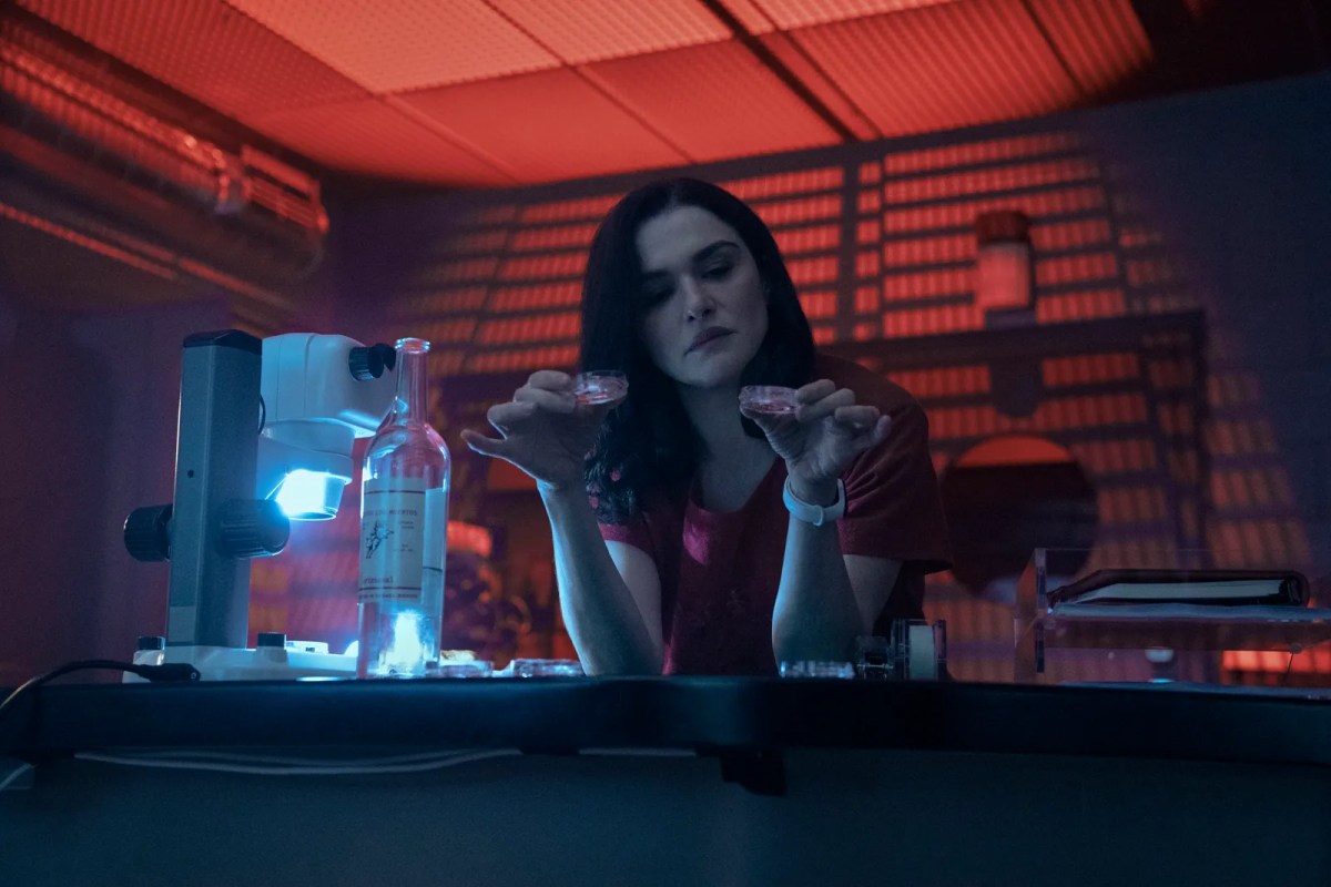 Rachel Weisz holds two petri dishes