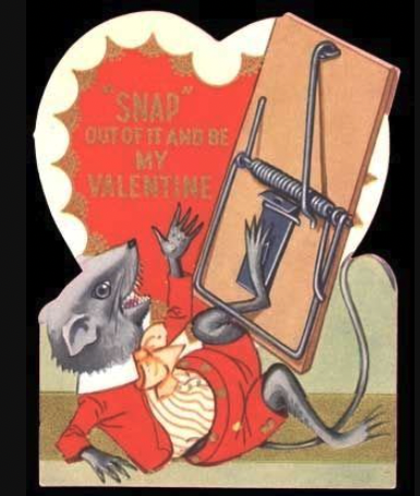 a mouse dressed in shorts, a striped shirt, and a collared jacket with a giant bow screams as its leg is trapped in a mousetrap. text on a heart in the background reads "snap out of it and be my valentine"