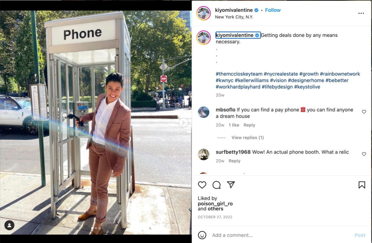 Kiyomi in a phone booth