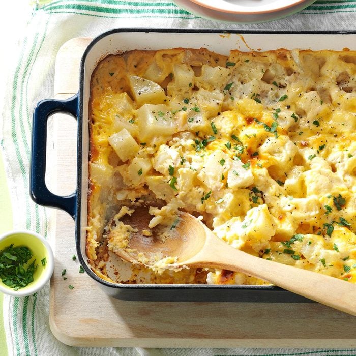a casserole dish of potatoes and cheese