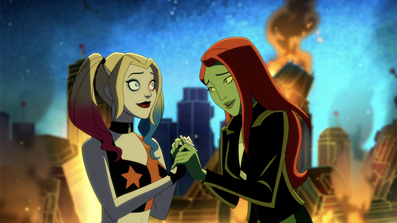 Harley and Ivy hold hands while Gotham City burns