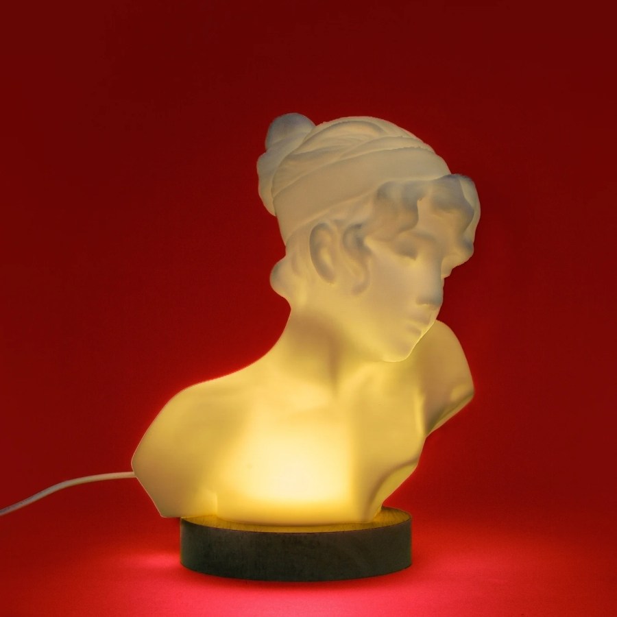 a bust of Sappho lit up