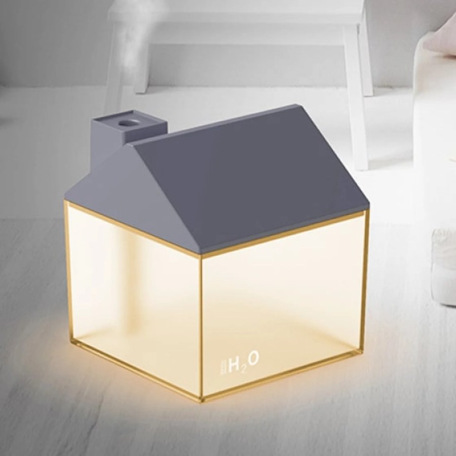 A glowing house-shaped diffuser