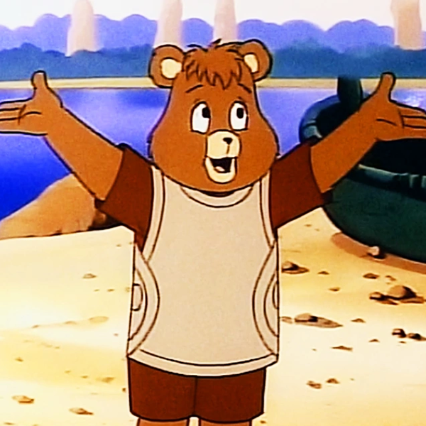 Teddy Ruxpin holds out his hands like he's explaining something 