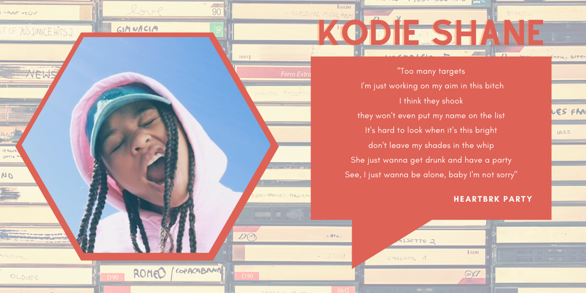 A photo of Black rapper Kodie Shane inside of a hexagon shaped frame with lyrics pulled from a song on a Coral talk bubble next to her. The background is faded cassette tapes.