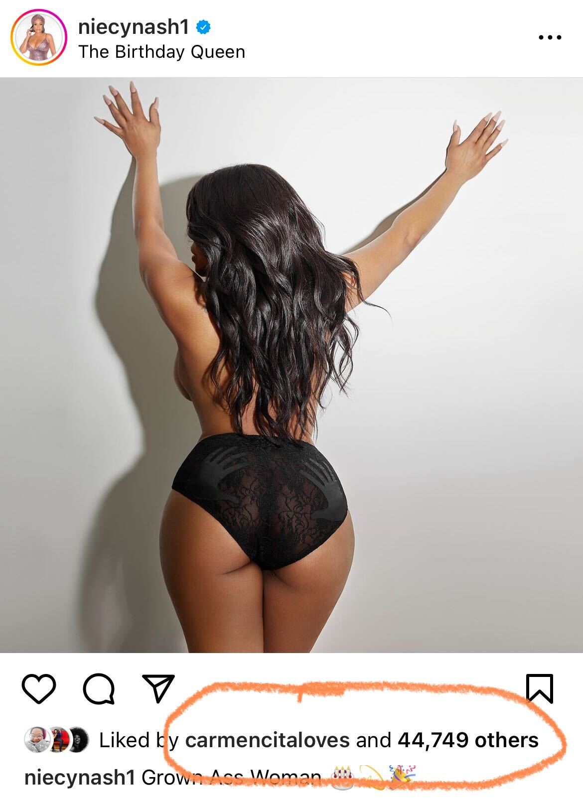 an instagram photo of niecy nash wearing some undies and leaning against a wall sexily. you can see that carmen liked the photo.