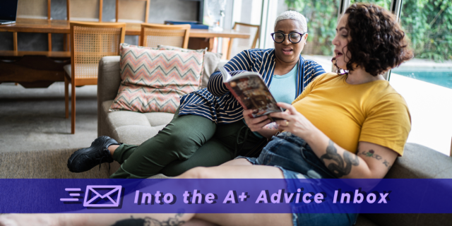 two queer women sit on a living room floor, with soft natural light, chatting and looking at a book together. one woman is Black with white hair and is wearing more masc clothes. one is fiar skinned and has brown curly hair and is wearing shorts and a yellow tee that reveal a number of black tattoos. they look happy. text reads: into the a+ advice box