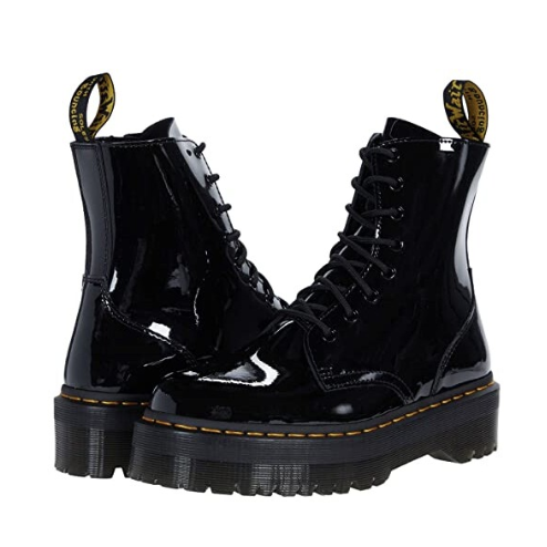 a pair of patent leather doc marten boots