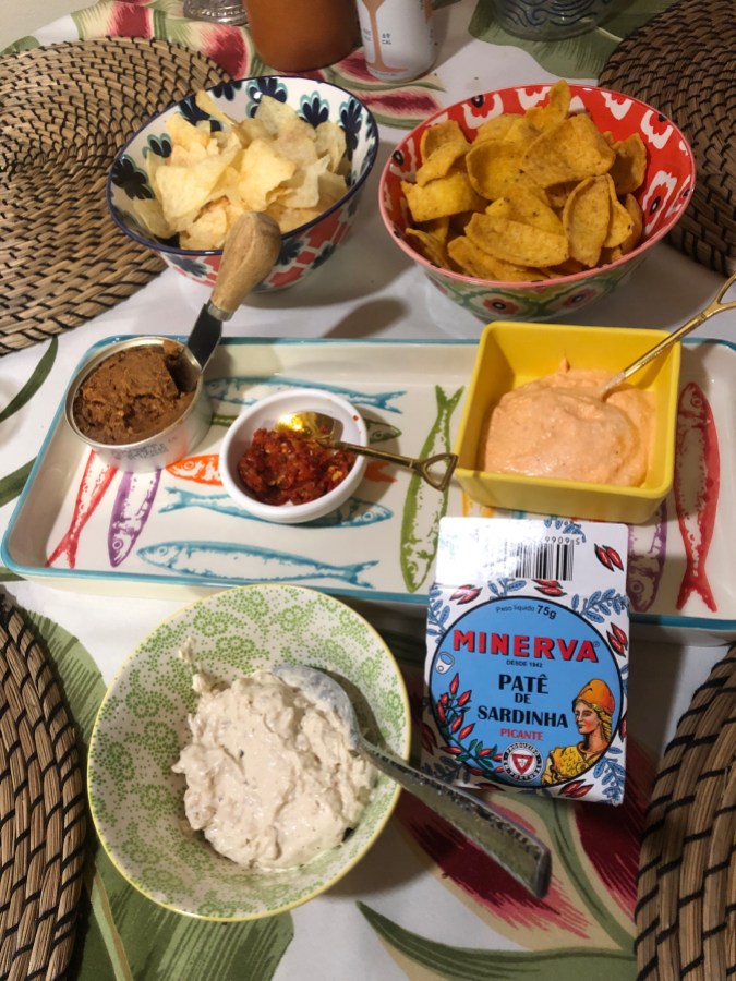 dips, chips, and a fish pate on a fish platter