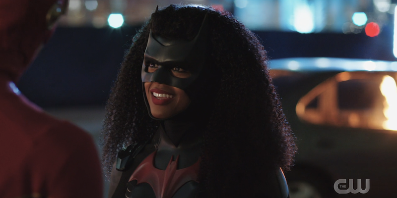screenshot of ryan wilder wearing the batsuit and smiling at barry allen
