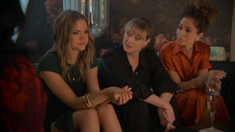 Stef dispenses motherly advice to Callie as they sit on a couch in Mariana's loft. Lena looks on, intently...but high as a kite. 