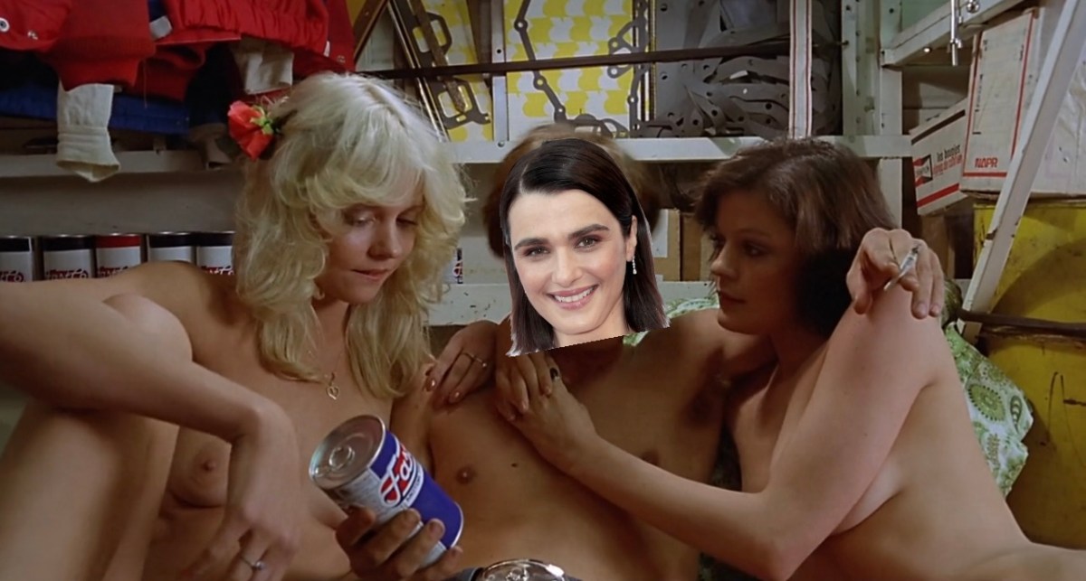 A still from Fast Company of Nicholas Campbell shirtless holding a can of oil with two naked women on his arms with Rachel Weisz's head poorly photoshopped on his body.