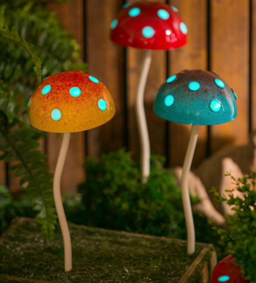 three glowing mushroom plant picks