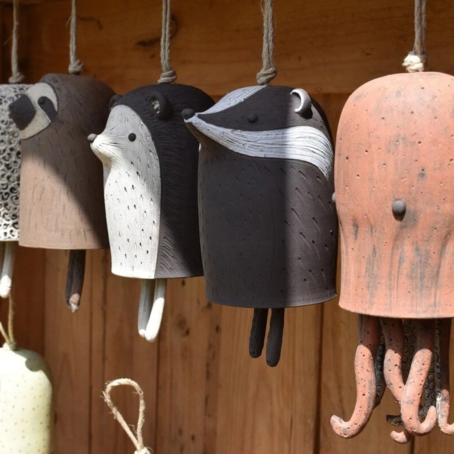 wind chimes shaped like little animals, including a hedgehog, a badger, a sloth, and an octopus