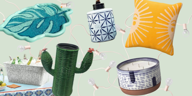 a splash pad shaped like a monstera leaf, a wicker planter shaped like a cactus, a large metal tub for holding ice and drinks, a white and blue ceramic tabletop tiki torch, a yellow outdoor throw pillow with suns on it, a five-wick large ceramic candle in blue and white, and pink string lights