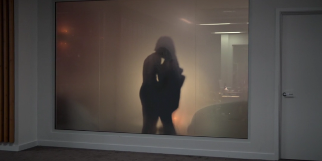 Keeley and Jack kiss behind frosted glass