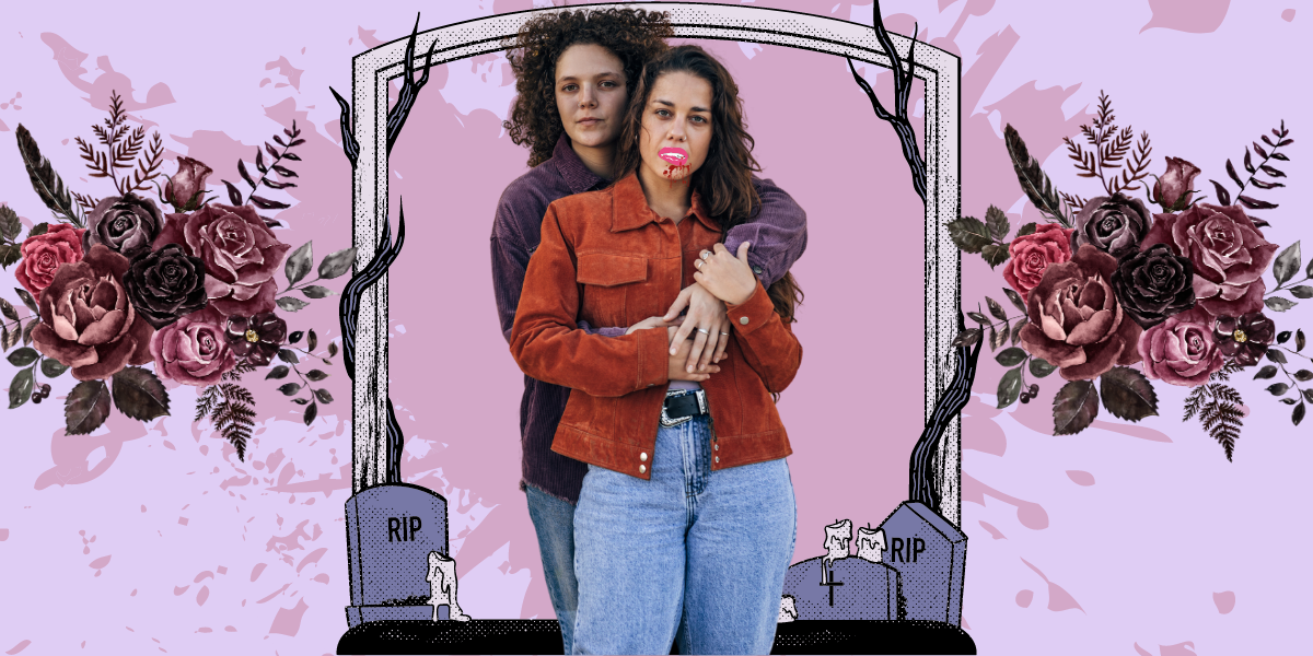 a woman with curly hair embraces a woman with long wavy hair who has cartoon fangs and blood on her chin. there's a graveyard background with tombstones that say RIP. there is also a faint blood spatter behind them and two bouquets of flowers on either side of them.