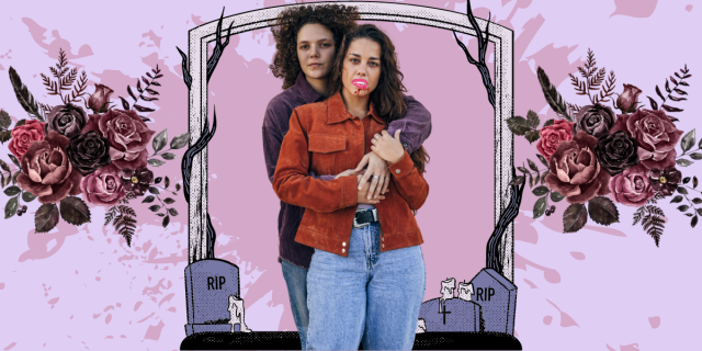 a woman with curly hair embraces a woman with long wavy hair who has cartoon fangs and blood on her chin. there's a graveyard background with tombstones that say RIP. there is also a faint blood spatter behind them and two bouquets of flowers on either side of them.