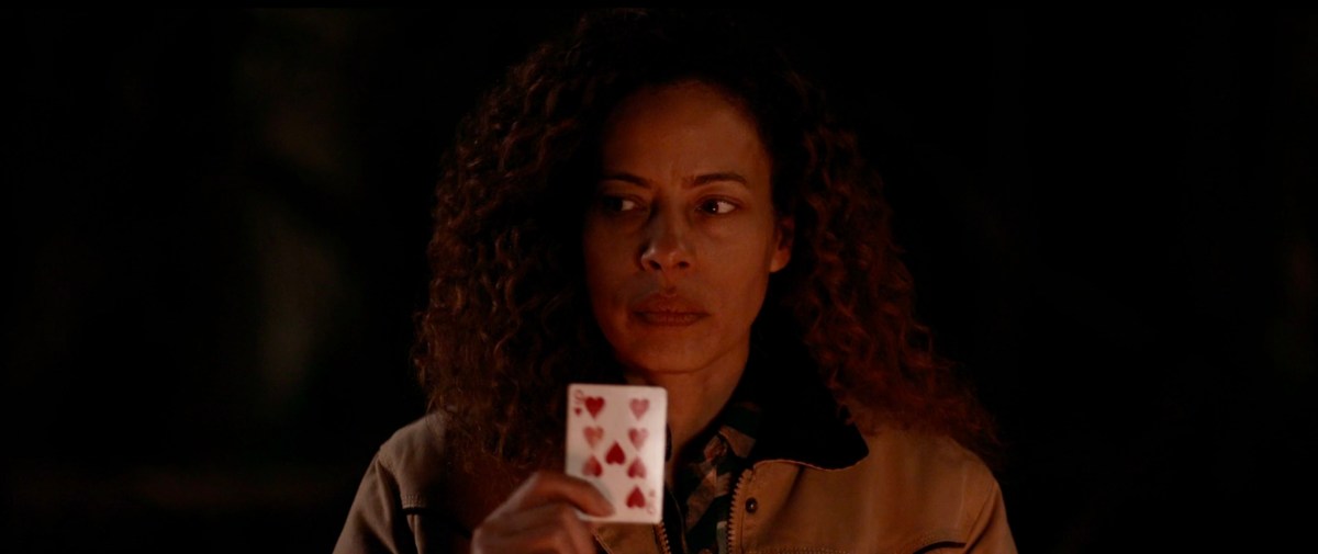 Taissa holding a card in yellowjackets 209
