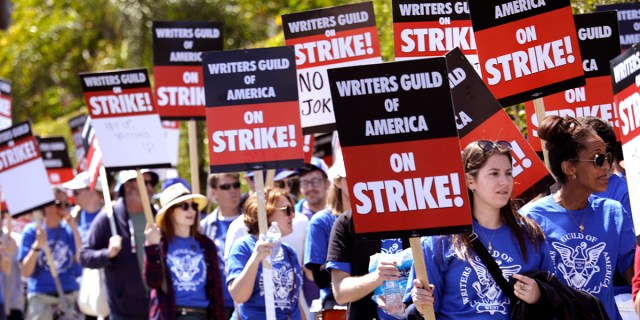 MAY 2, 2023 - WGA members walk the picket line on the first day of their strike in front of Paramount Studios in Hollywood on May 2, 2023. The union were unable to reach a last minute-accord with the major studios on a new three-year contract to replace one that expired Monday night
