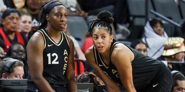 Chelsea Gray #12 and Candace Parker #3 of the Las Vegas Aces talk as they wait to check into a game against the Minnesota Lynx in the second quarter at Michelob ULTRA Arena on May 28, 2023 in Las Vegas, Nevada. The Aces defeated the Lynx 94-73. NOTE TO USER: User expressly acknowledges and agrees that, by downloading and or using this photograph, User is consenting to the terms and conditions of the Getty Images License Agreement. (Photo by Ethan Miller/Getty Images)