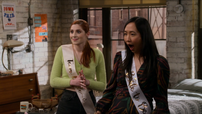 How I Met Your Father: Ellen and her girlfriend have bachelorette sashes and Ellen's jaw is dropped in surprise