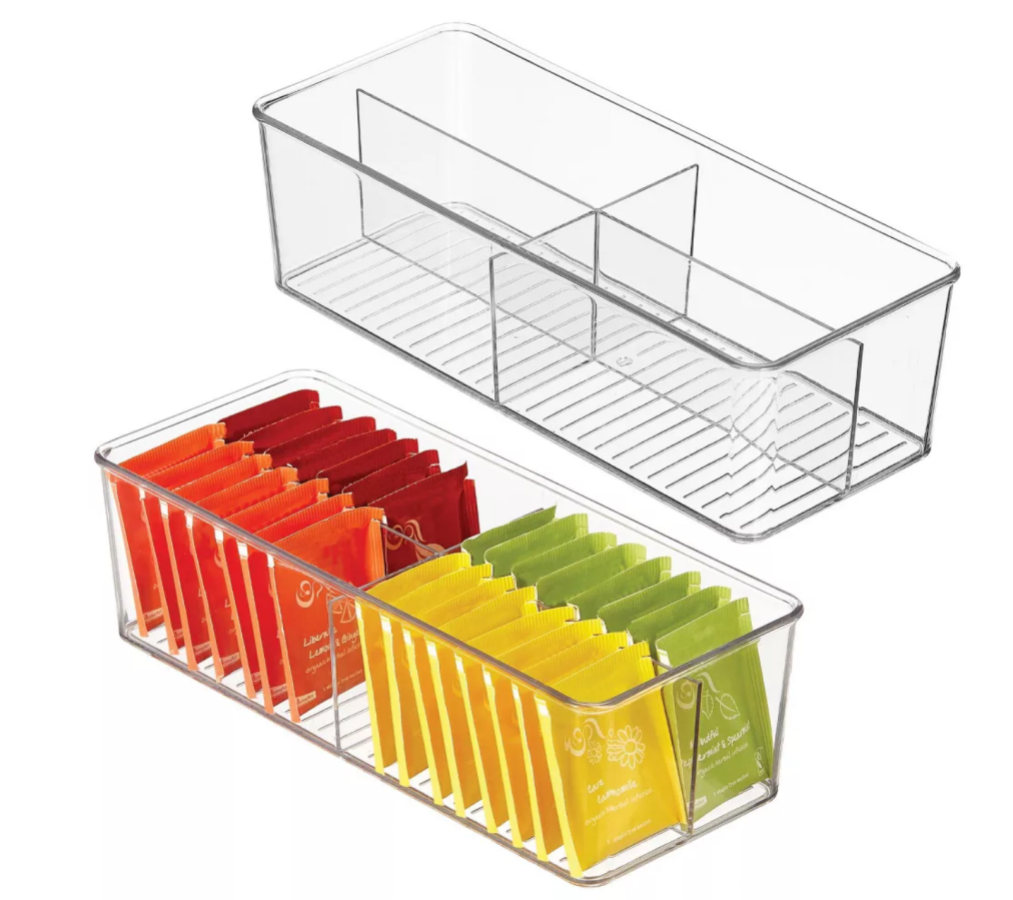 a four-compartment kitchen caddy holding assorted tea bags