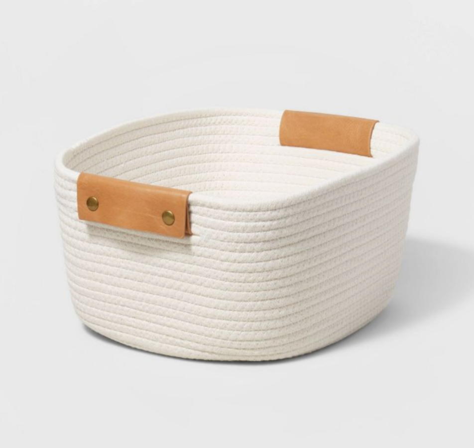 an off white woven basket