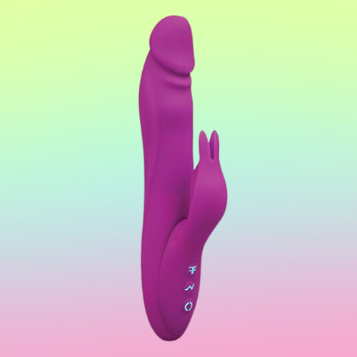 Against a green, blue, and pink ombre background, there is the FemmeFunn Booster Rabbit vibrator, a pink, silicone, dual-stem vibrator with silver buttons on the front. The internal portion is shaped like a penis. The external portion is shaped like a rabbit's head with rabbit ears.