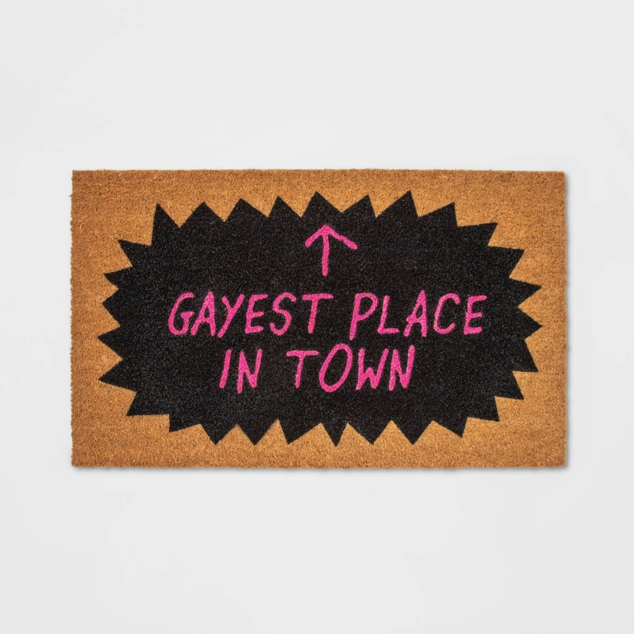 target pride 2023 merch drop: a doormat with a hot pink arrow that says "gayest place in town"