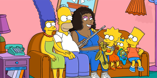 Lizzo and Sasha Flute sit on the couch with The Simpsons
