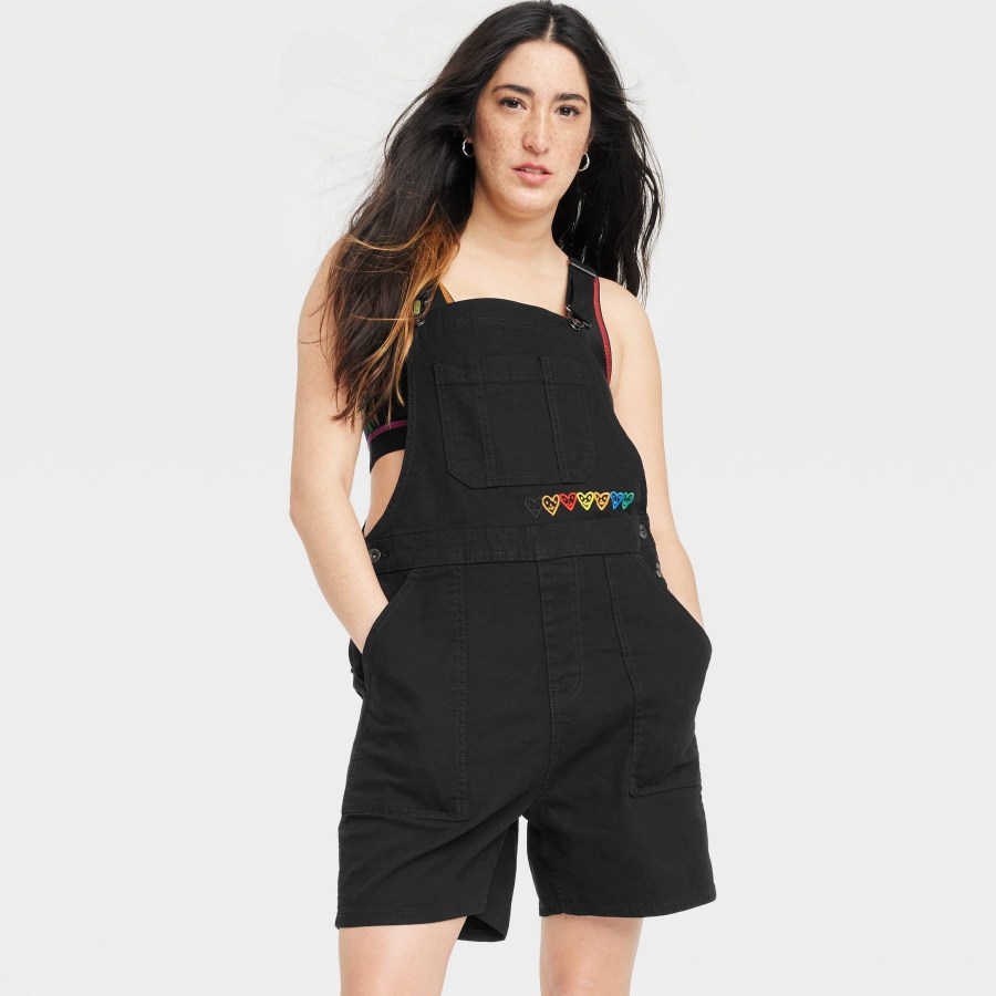 target pride 2023 merch drop: black shortfalls that have rainbow hearts with smilies in them over the right side of the waist