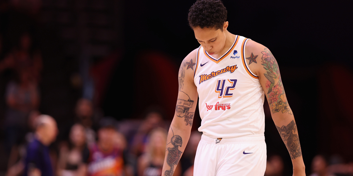 Brittney Griner walks up the court at a Phoenix Mercury game.