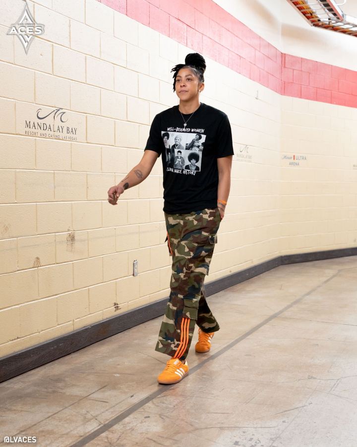 Candace Parker walks into the Juneteenth game.