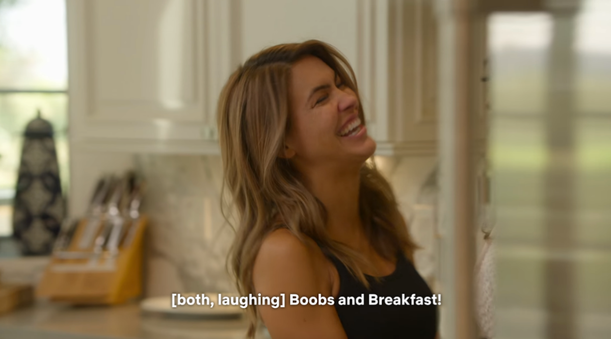 Chrishell laughing on Selling Sunset season six and saying "Boobs and Breakfast!"