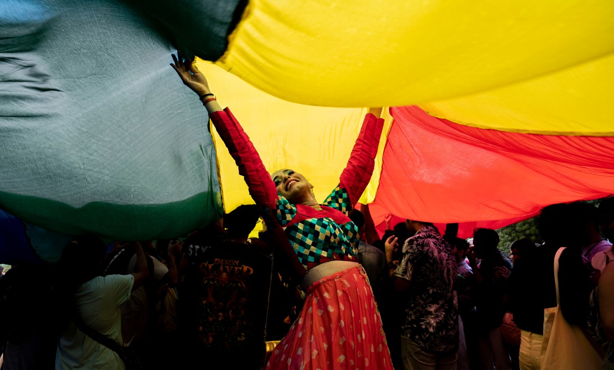 MUMBAI, INDIA JUNE 24: Members of LGBTQ community dances during a pride parade celebrating lesbian, gay, bisexual, transgender, and queer (LGBTQ) social and self-acceptance, achievements, legal rights, and pride, at Azaid Maidan, CSMT, on June 24, 2023 in Mumbai, India. (Photo by Anshuman Poyrekar/Hindustan Times via Getty Images)