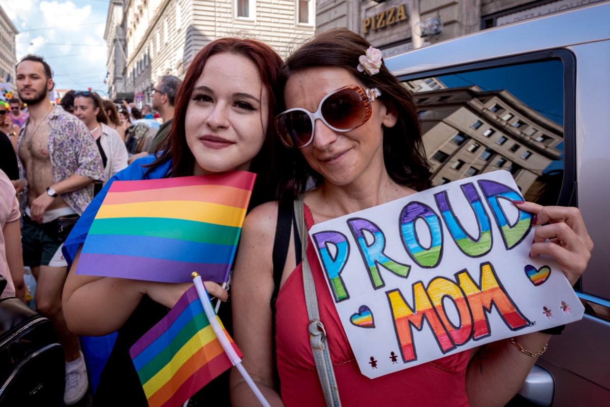 ROME, ITALY - JUNE 10: People attend Rome Pride Parade 2023 on June 10, 2023 in Rome, Italy. This year, the organisers chose the theme 'Queeresistenza' (Queer Resistance), with campaigners condemning what they called "multiple attacks" on the LGBTQ community suffered since Prime Minister Giorgia Meloni's government took office, and also proudly claiming that there are different families and relationships that cannot be ignored. The regional government withdrew sponsorship for the event, accusing the organisers of using the event to lobby in favour of surrogacy, which is illegal in Italy. (Photo by Stefano Montesi - Corbis/Corbis via Getty Images)