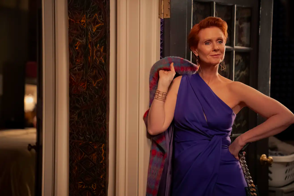 And Just Like That recap: Miranda in a one-shoulder purple dress with her coat slung over her shoudler