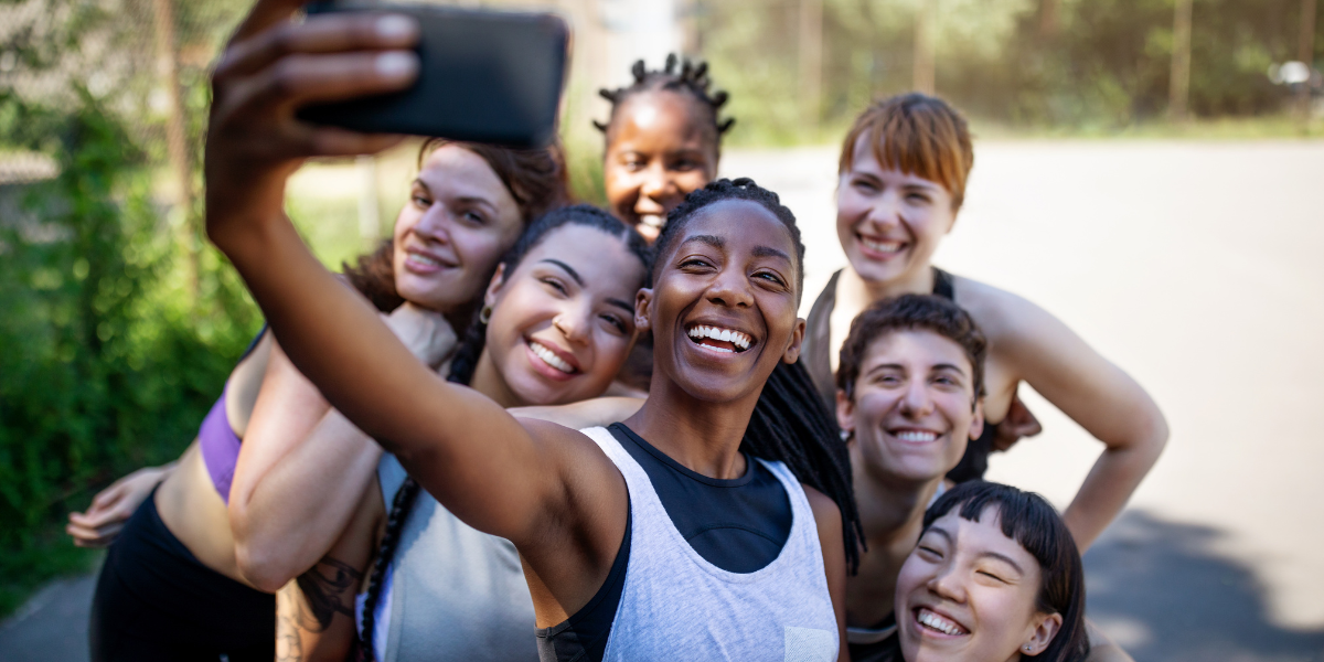 a group of friends take a selfie together