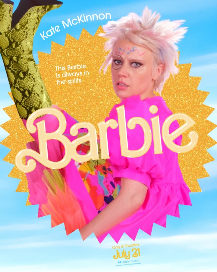 Kate McKinnon as Weird Barbie (she has on green leopard boots and marker drawings on her face)