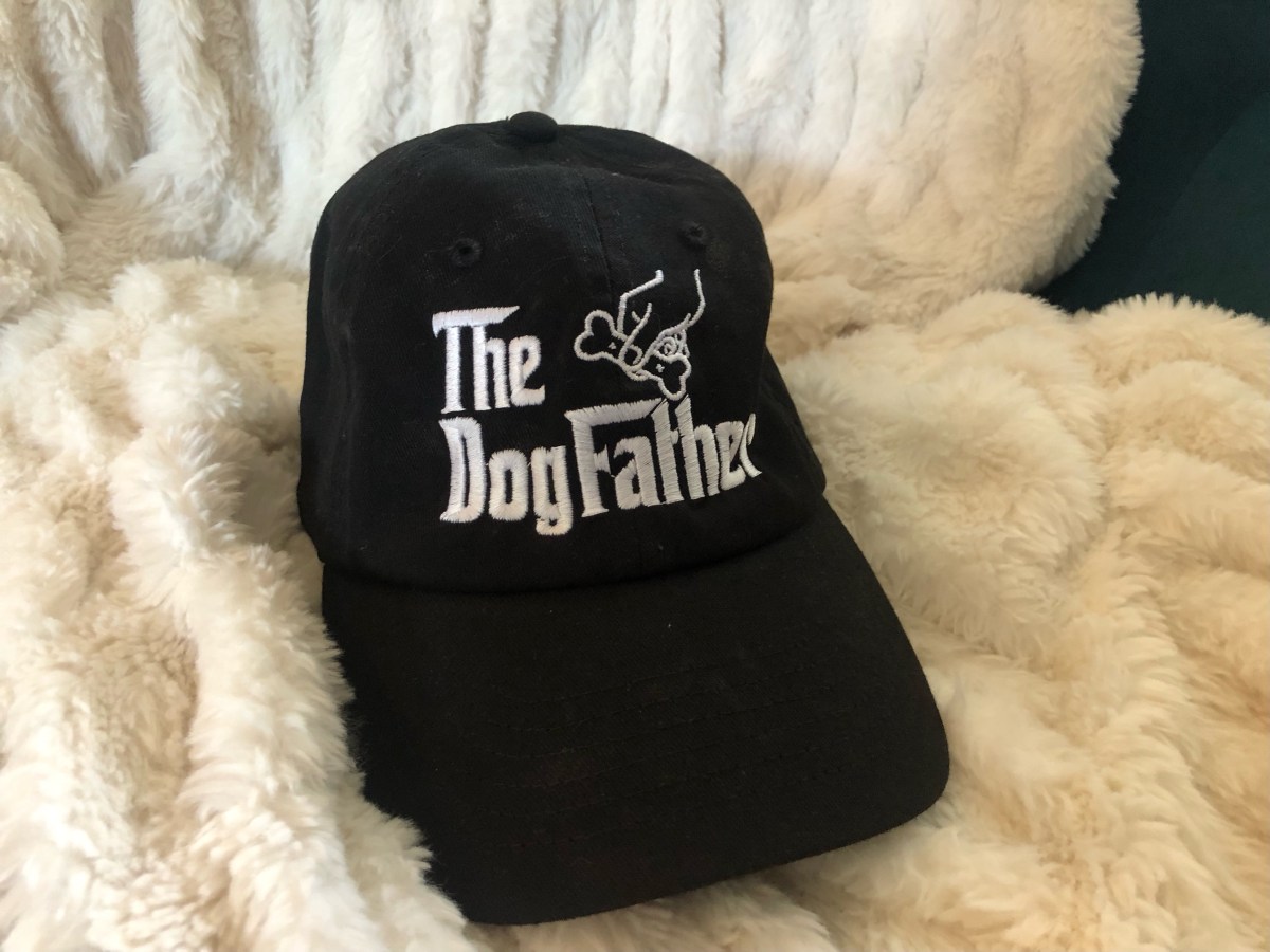 a black hat that reads THE DOGFATHER