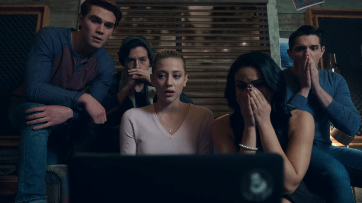 Archie, Jughead, Betty, Veronica, and Kevin look at a computer screen in horror on Riverdale