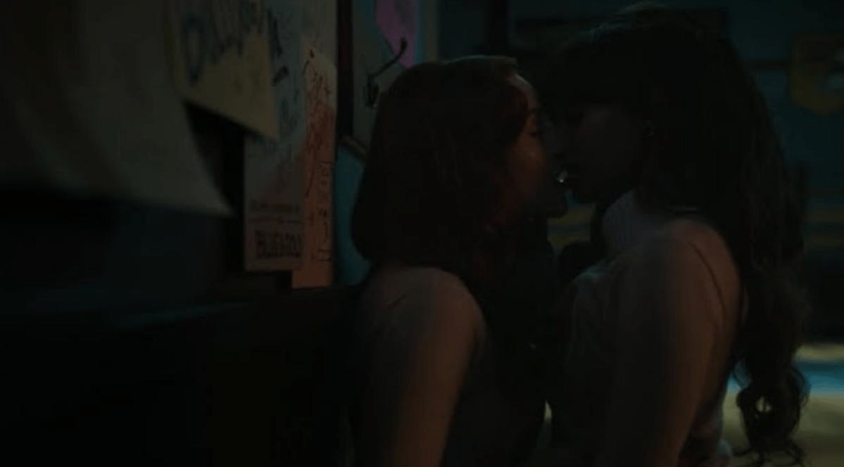 Cheryl and Toni kiss against a blackboard in Riverdale