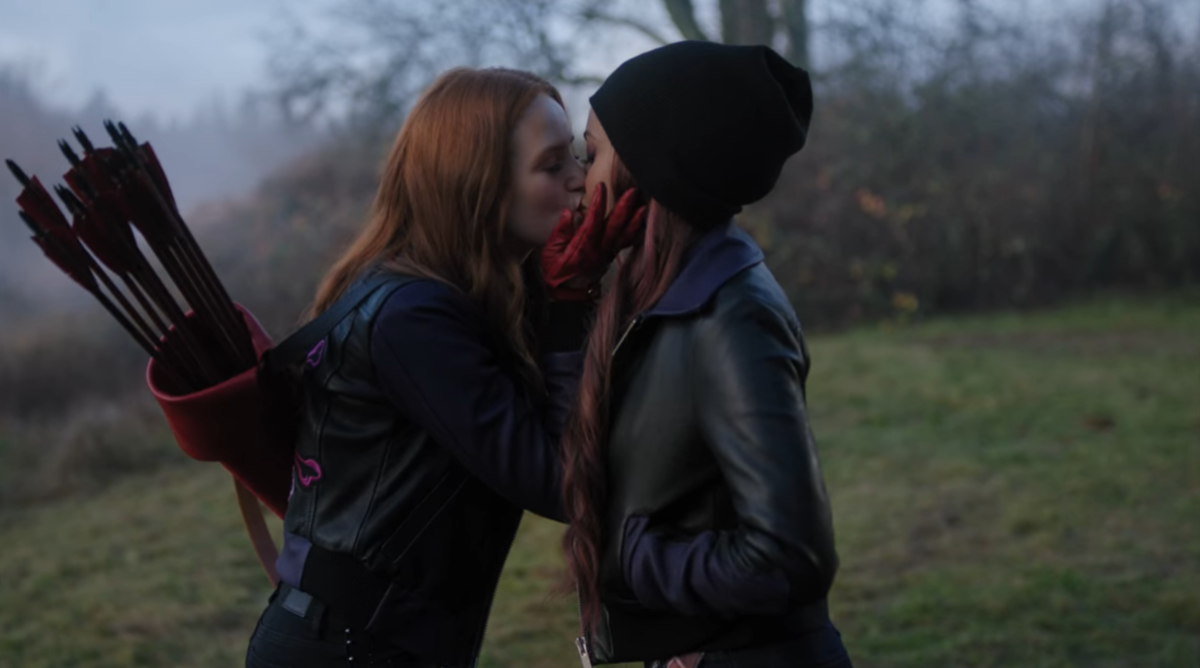 Cheryl kisses Toni while wearing her bow and arrow in Riverdale