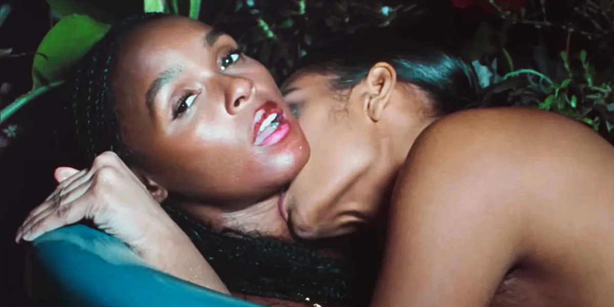 Janelle Monae gets smooched on in a music video from The Age of Pleasure