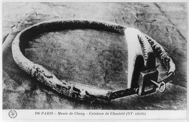 a grainy photo of a chastity belt
