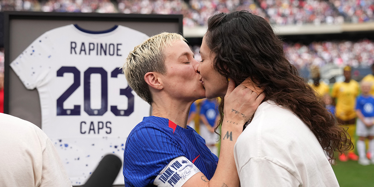 Megan Rapinoe and Sue Bird kiss during the ceremony honoring Rapinoe at her final USWNT game