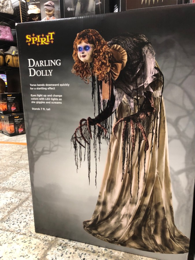 an animatronic named Darling Dolly that looks like a spooky woman hunched over with spindly witchy branch fingers