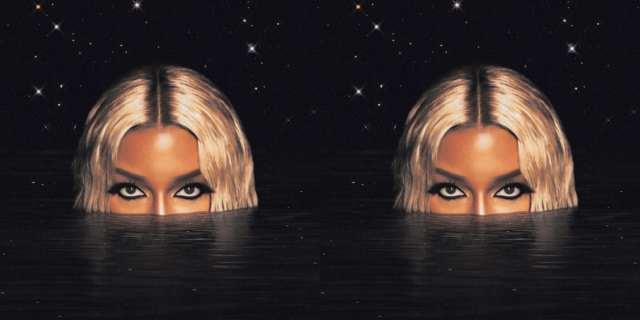 Victoria Monét's Jaguar II album cover, featuring Monét coming out of inky black water.